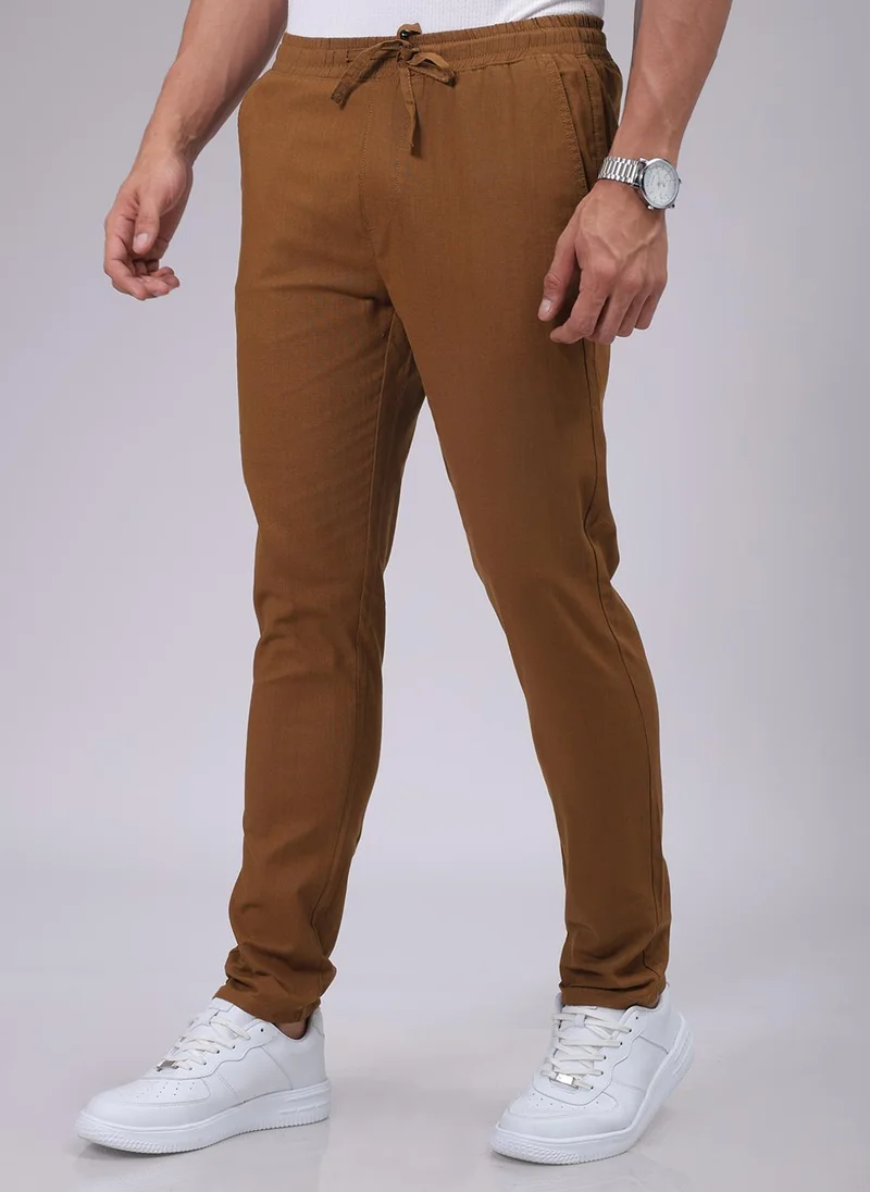 ذا انديان كراج كو Men Slim Solid Brown Joggers
