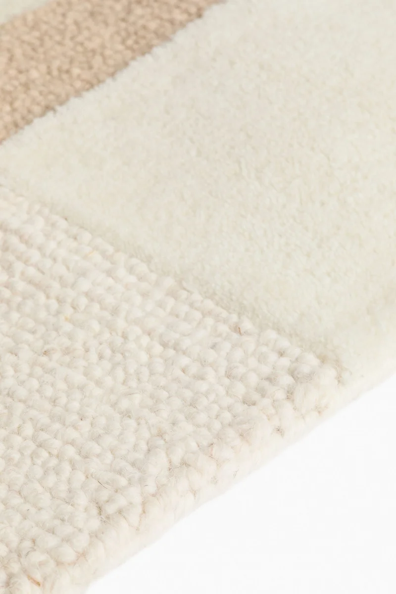 اتش اند ام سجادة صوف منقوشة