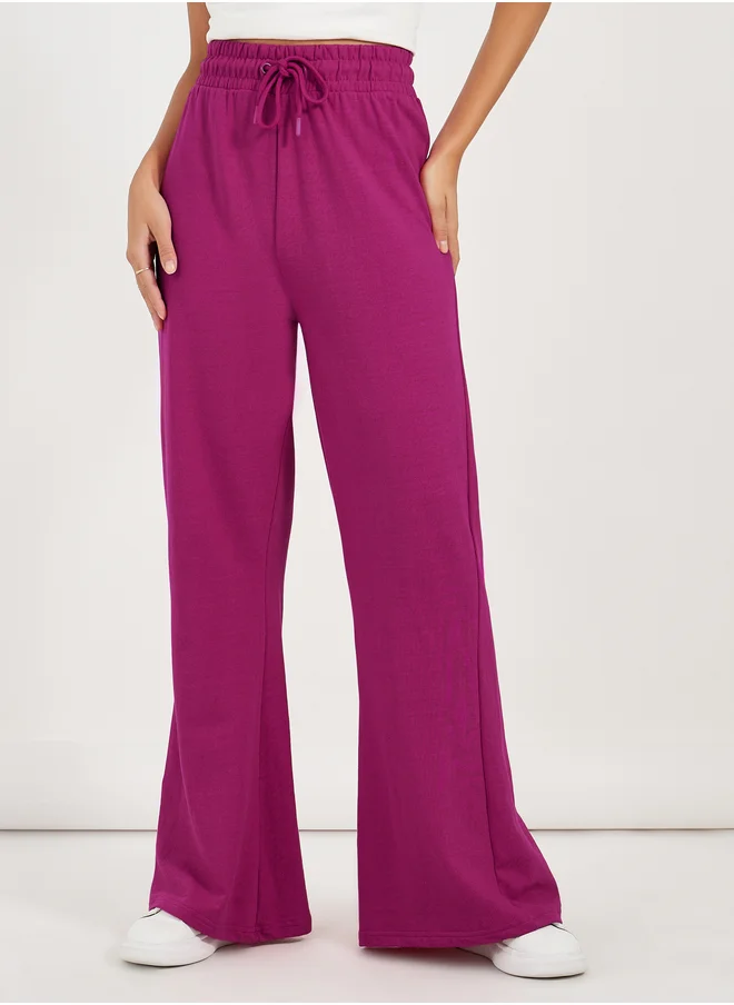 Styli Solid Drawstring Waist Flared Joggers