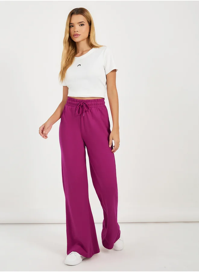 Styli Solid Drawstring Waist Flared Joggers