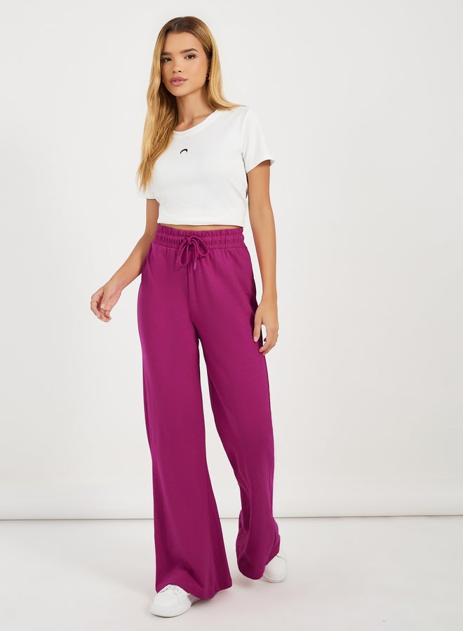 Styli Solid Drawstring Waist Flared Joggers  - Image 1
