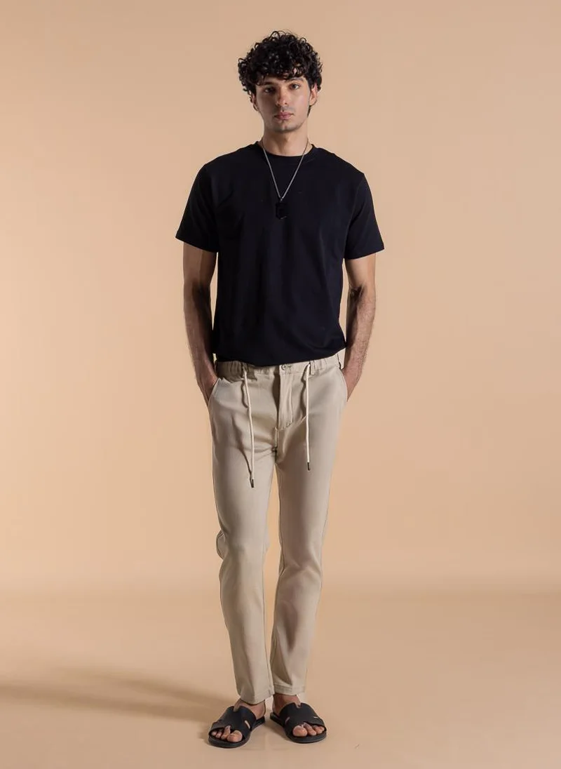 Shapes beige DETAILED SLIM COMFORT TROUSERS for Men | Best Price UAE