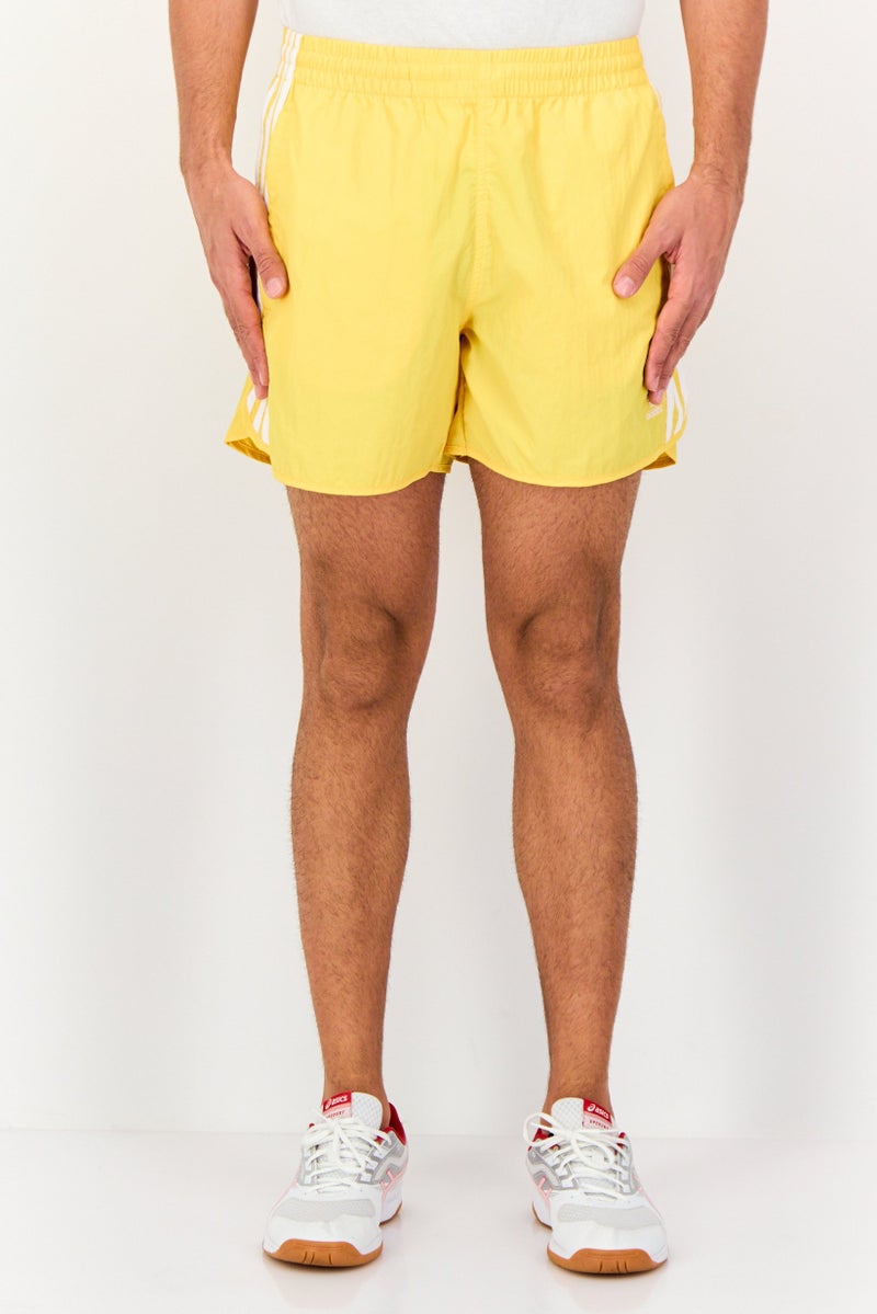 adidas Originals Men Sportswear Fit Drawstring Outdoor Sprinter Shorts, Yellow  - Image 1