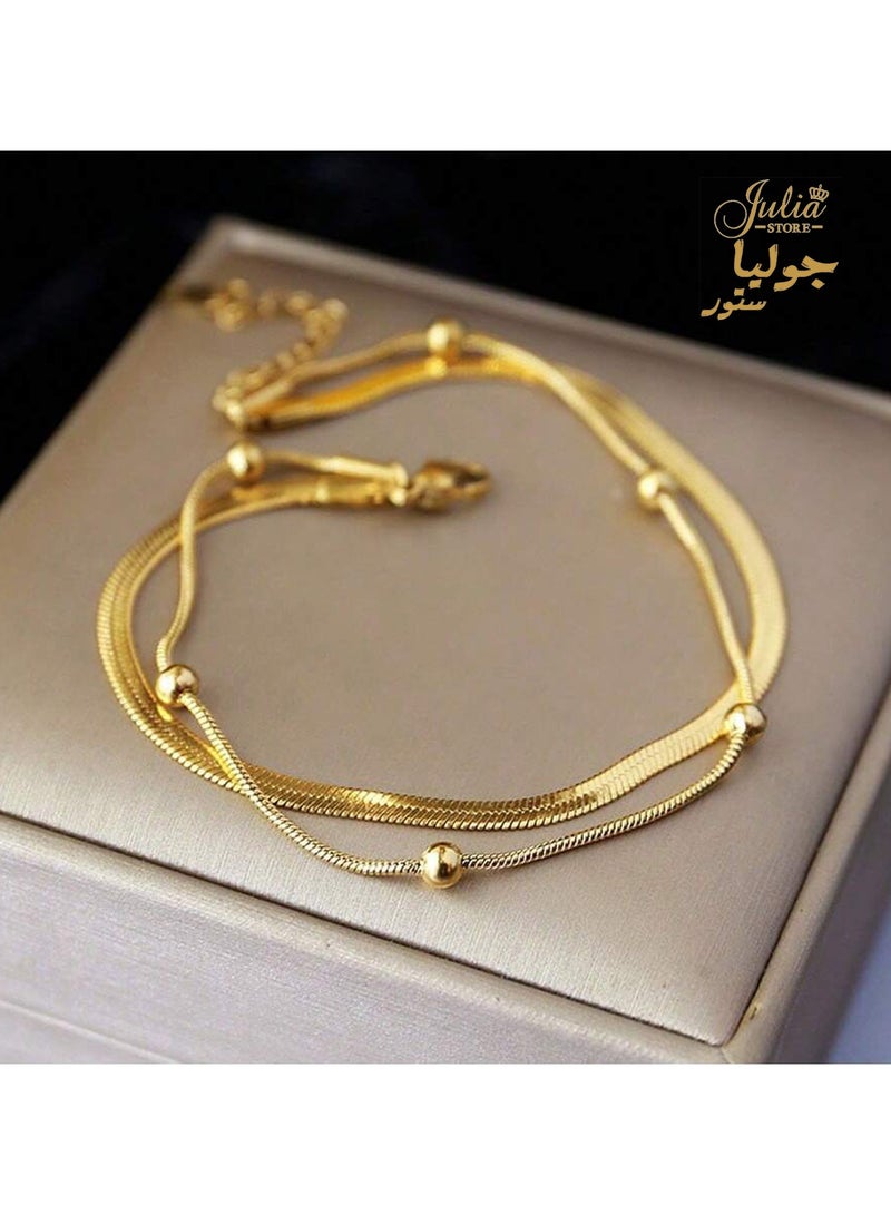 جوليا ستور سوار متعدد الطبقات من الفولاذ المقاوم للصدأ مطلي بالذهب عيار 18 قيراطًا على شكل ثعبان متعرج أنيق وعصري بسيط من سلسلة ثعبان - Image 1