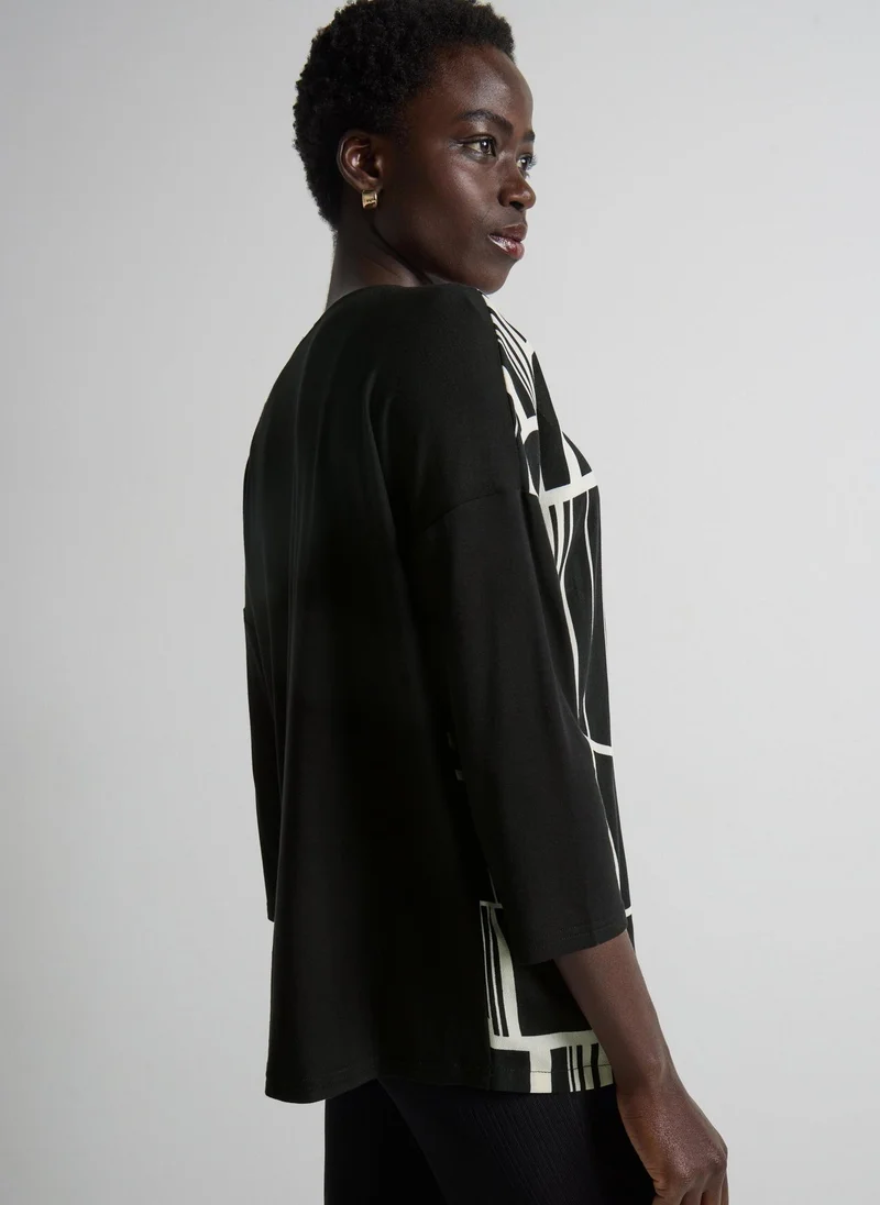 ماتلان بلوزة بأكمام ثلاثة أرباع بنقش هندسي أسود من إت يو