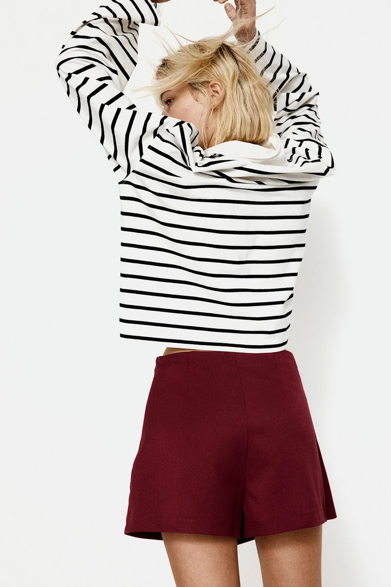 اتش اند ام تنورة بتصميم ملفوف