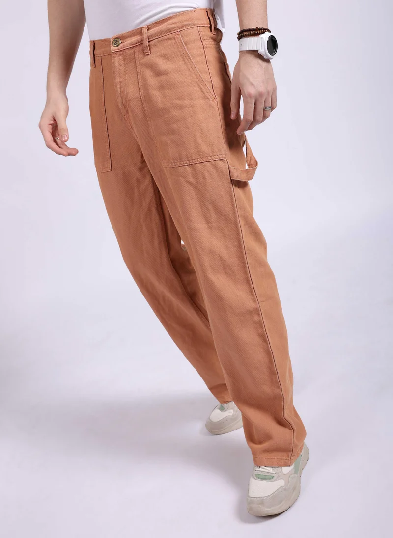 ذا انديان كراج كو Men Baggy Solid Mid-Rise Stretchable Jeans