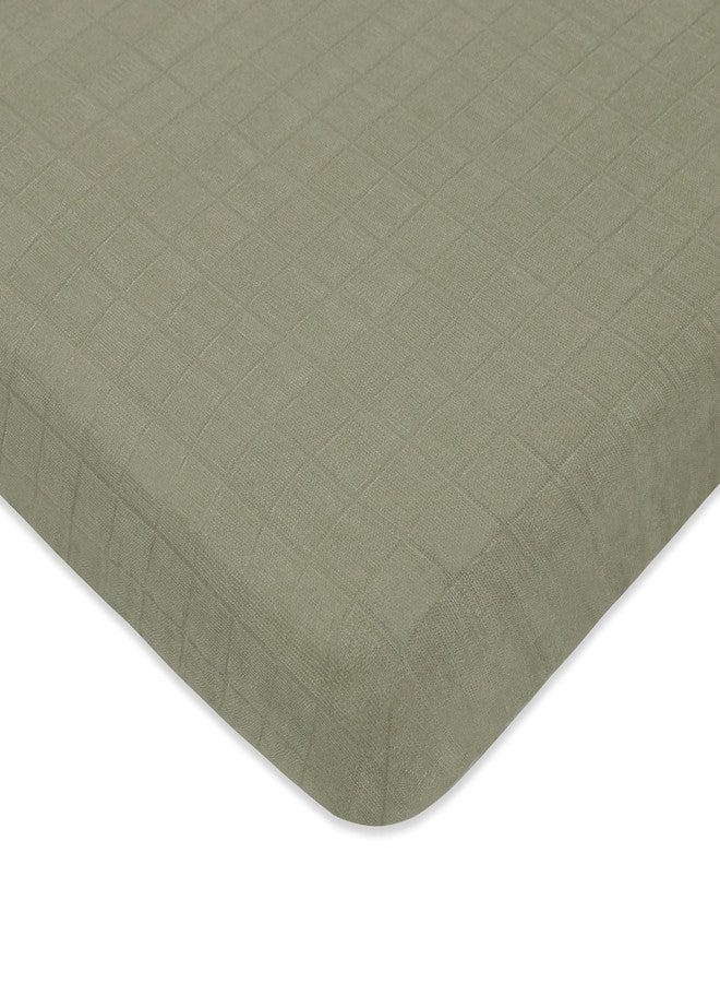 Babyletto 100% Organic Cotton Mini Crib Sheet, GOTS-Certified, Fitted 360°, Ultra-Soft and Breathable Muslin - Matcha Green - Image 1