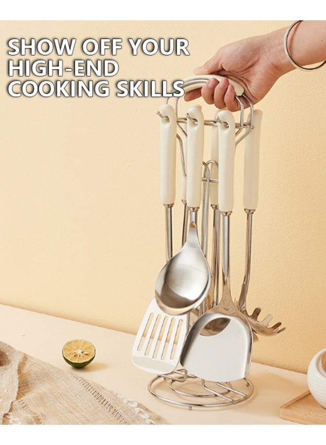 مجموعة أدوات المطبخ الصناعية من الفولاذ المقاوم للصدأ من سبع قطع (أبيض). مجموعة أدوات الطهي من 7 قطع مع رف تعليق. تشمل ملعقة مفصلة، ملعقة نحاسية مفصلة، ملعقة كبيرة، ملعقة شوربة، ملعقة نحاسية، ملعقة پاستا. - Image 2