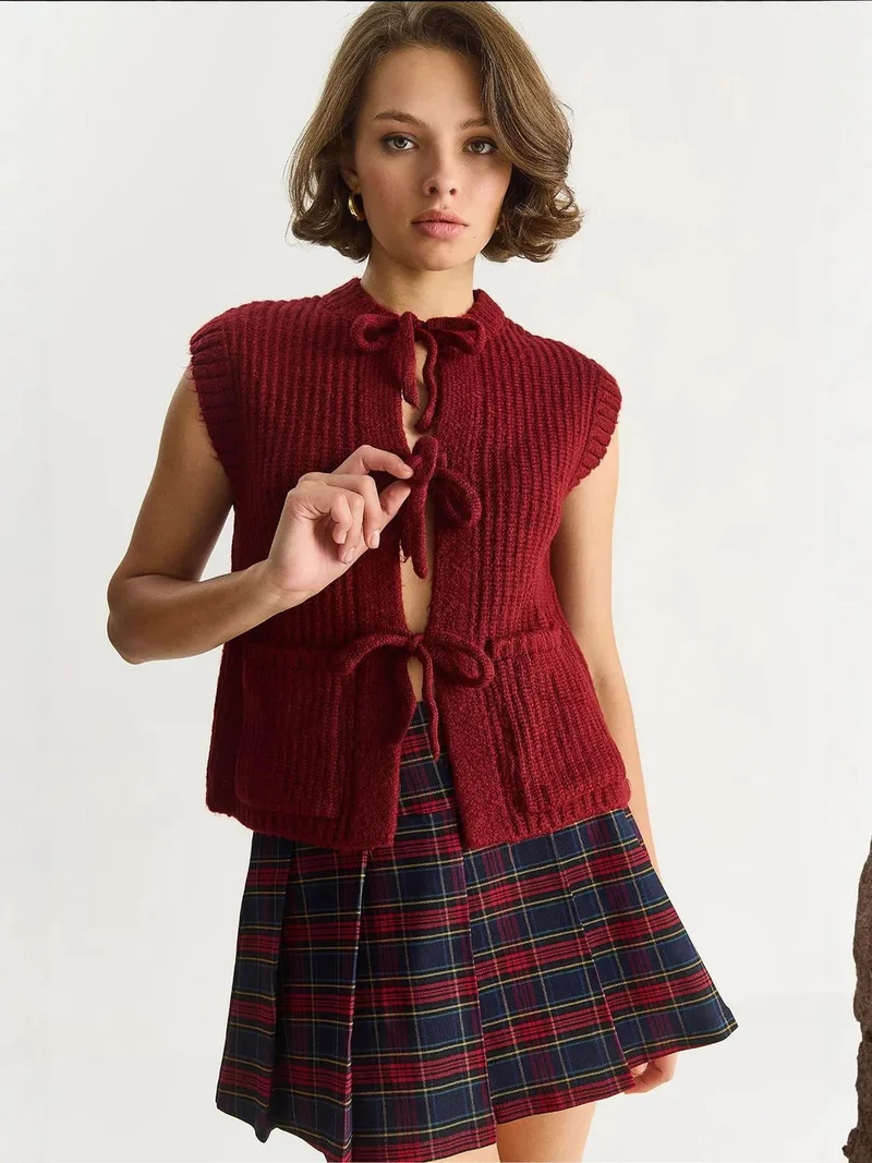 بيانكو لوتشي سترة محبوكة بنقوش من لوكسي مع ربطة عنق