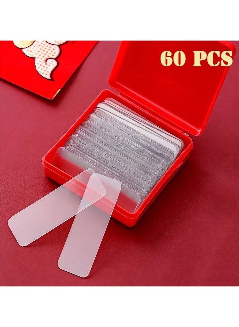A set of transparent (double-sided) adhesive tapes in a box containing between 50 and 60 pieces per box. - Image 1