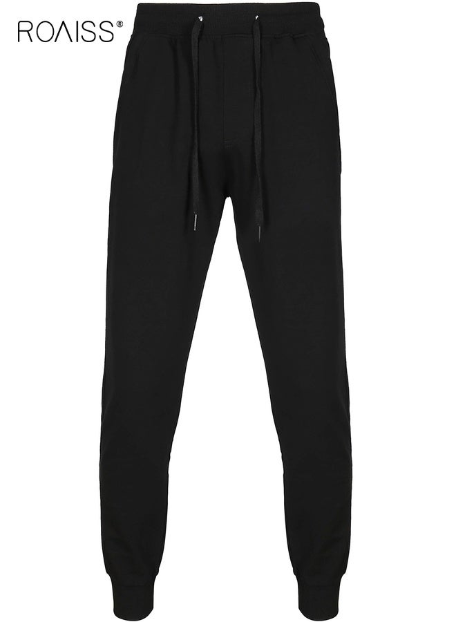 رويس بنطال رياضي رجالي من القطن بقصّة عادية ورباط للإغلاق وخصر مرن وجيوب بسحّاب، بنطال رياضي خارجي فضفاض بقصّة مستقيمة، باللون الأسود النقي - Image 2