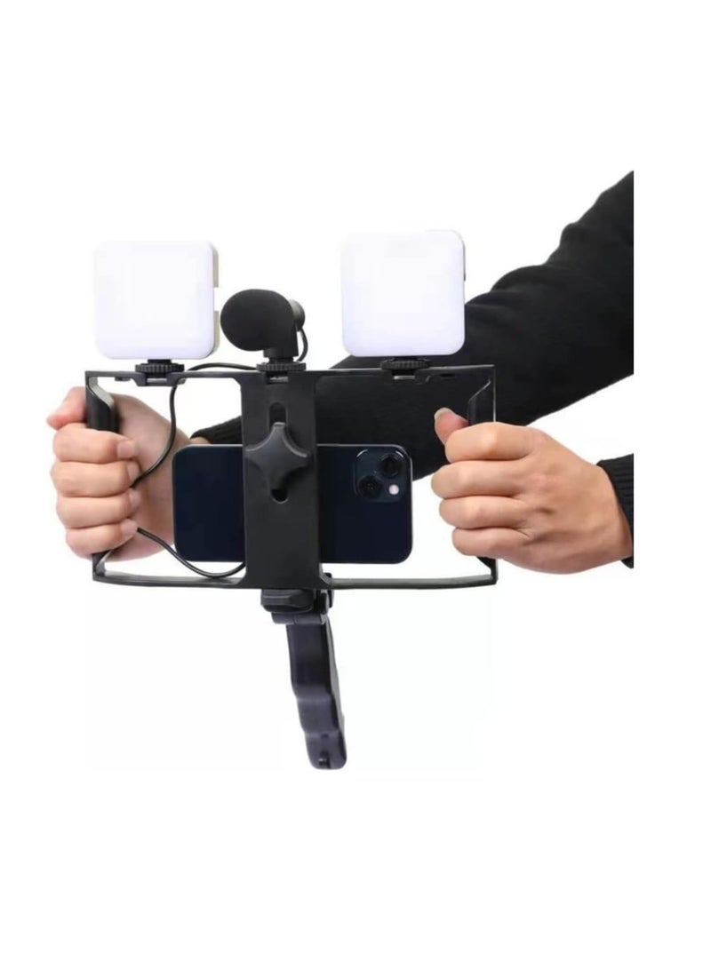 حامل كاميرا فيديو 5 في 1 بمقبض تثبيت وميكروفون بندقية ومجموعة إضاءة ليد لأي موبايل لصناعة الأفلام والفيديوهات الاحترافية إطار شكل حرف U و2 مصباح وحامل أسود أحمر - Image 1