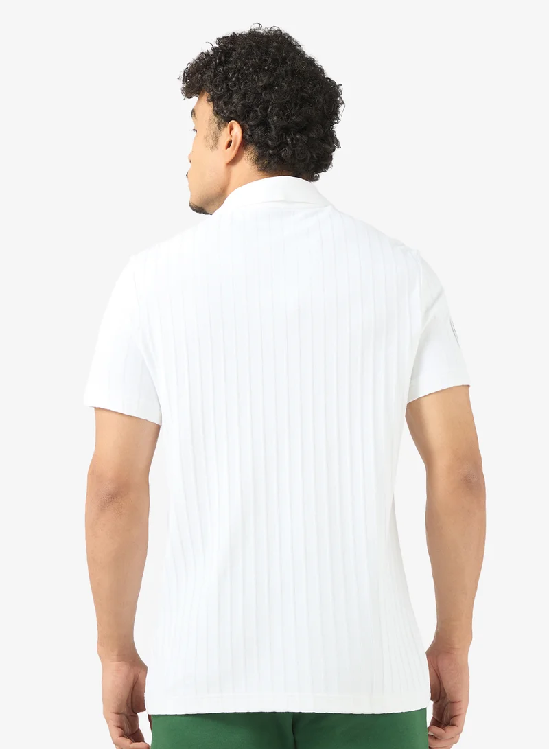 لاكوست بولو بشعار