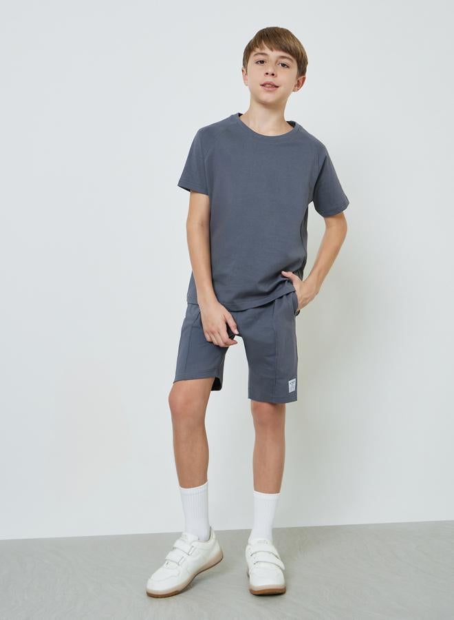 Styli Teen Boys Raglan Sleeve T-shirt and Badge Detail Shorts Set - Image 1