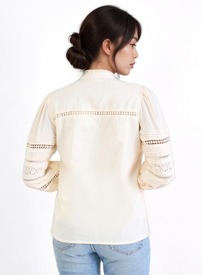 ستايلي بلوزة بتفاصيل شيفلي وأكمام طويلة - Image 4