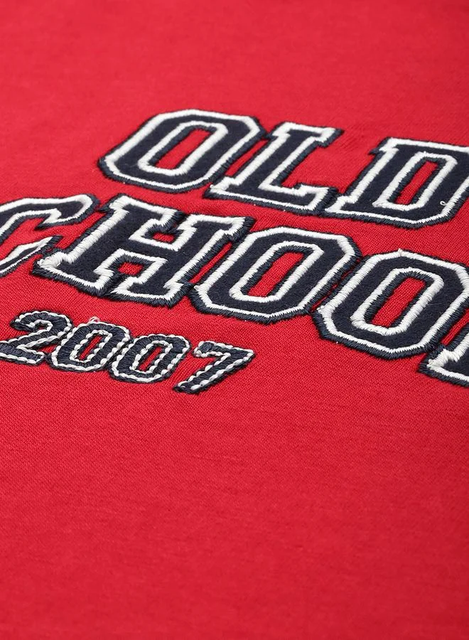 ديلينجر تيشيرت واسع بياقة بولو وأكمام طويلة