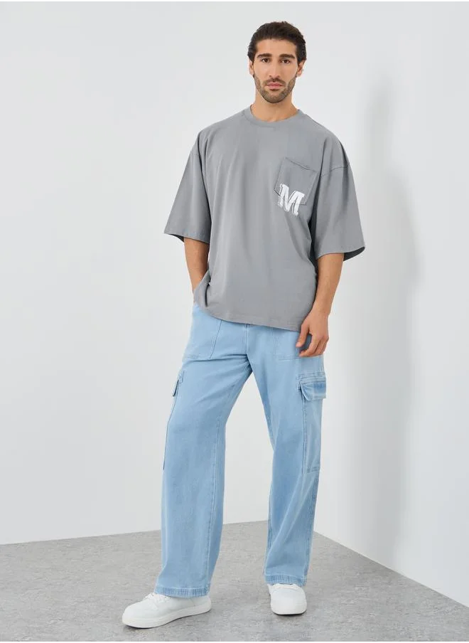 Styli Styli Slogan Print Oversized T-Shirt with Chest Pocket Detail