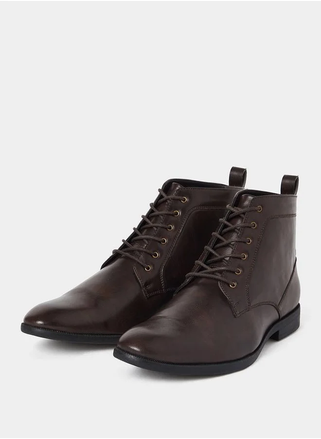 ستايلي High Ankle Faux Leather Boots