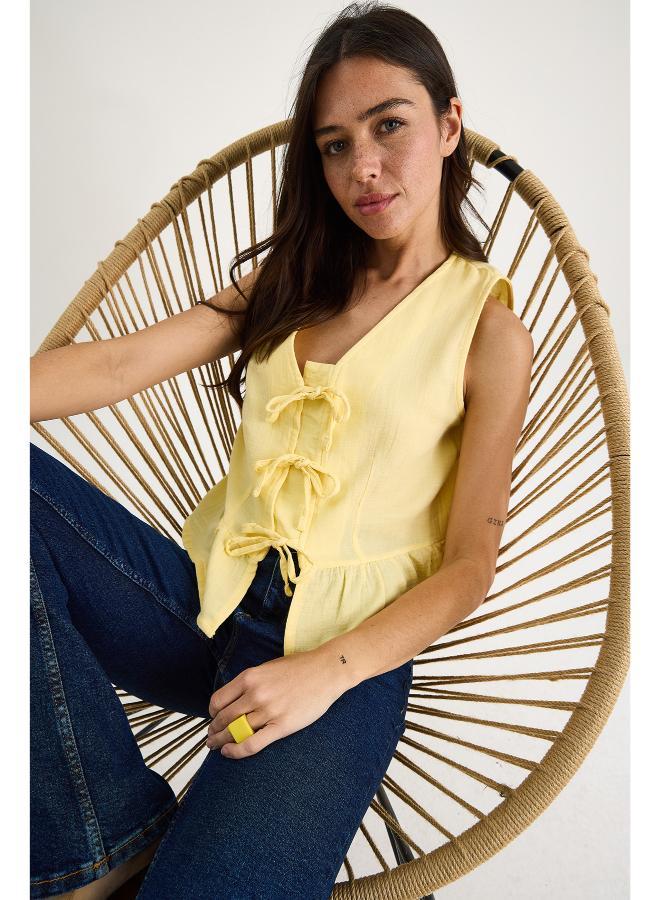 Ginger Bow Tie Up Detail Peplum Top - Image 3