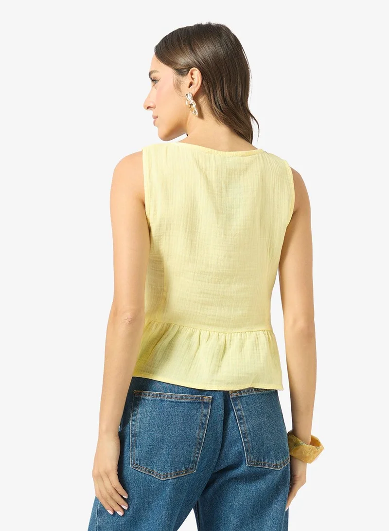 Ginger Bow Tie Up Detail Peplum Top