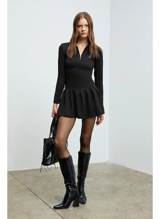 Grimelange ISANDRIA Women's polo-collared, front-zipper detailed, long-sleeve, belted, fitted, pleated mini black dress.