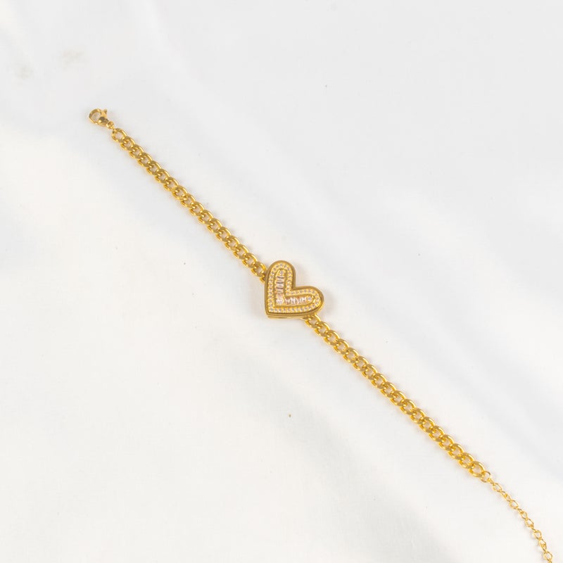 أنسيال أستانليس ستيل ذهبي شكل قلب مرصع بفصوص الزيركون - Image 1