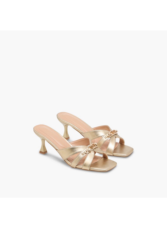 Celeste Women's Solid Slip-On Cross Strap Sandals with Metal Accent - Image 1