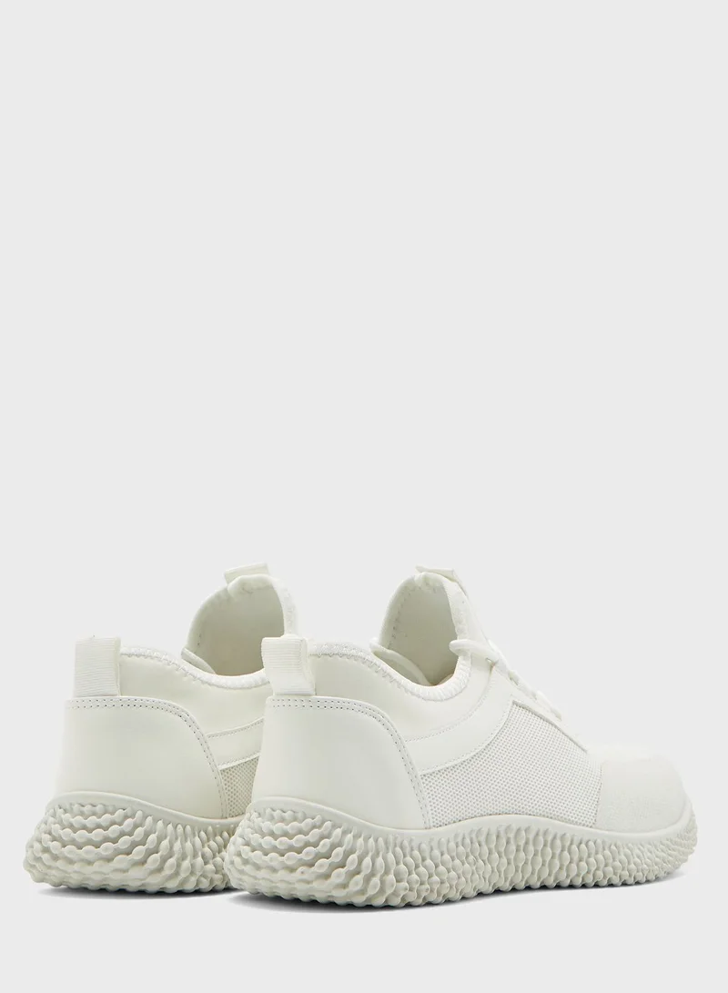 Seventy Five Mesh Spike Sole Sneakers