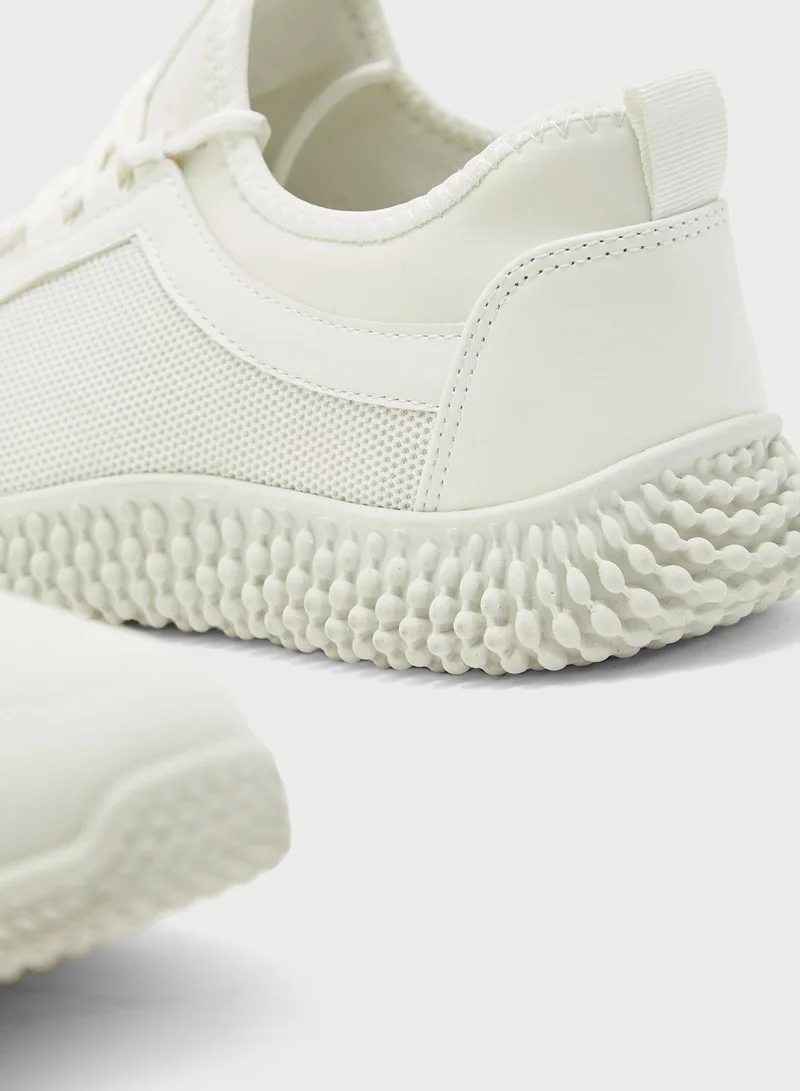 Seventy Five Mesh Spike Sole Sneakers