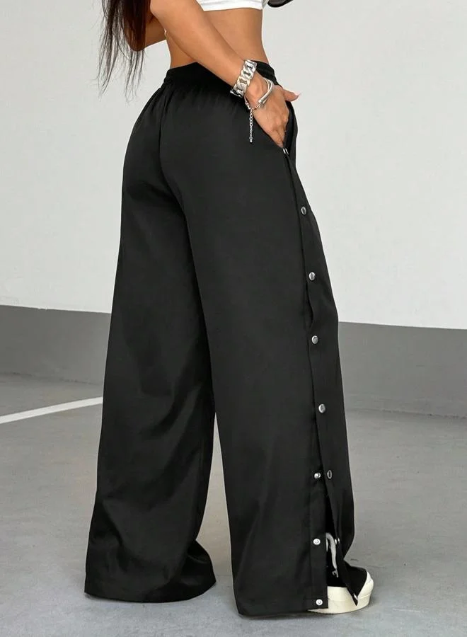 تايك تو بنطال بأرجل واسعة وأزرار جانبية كباس