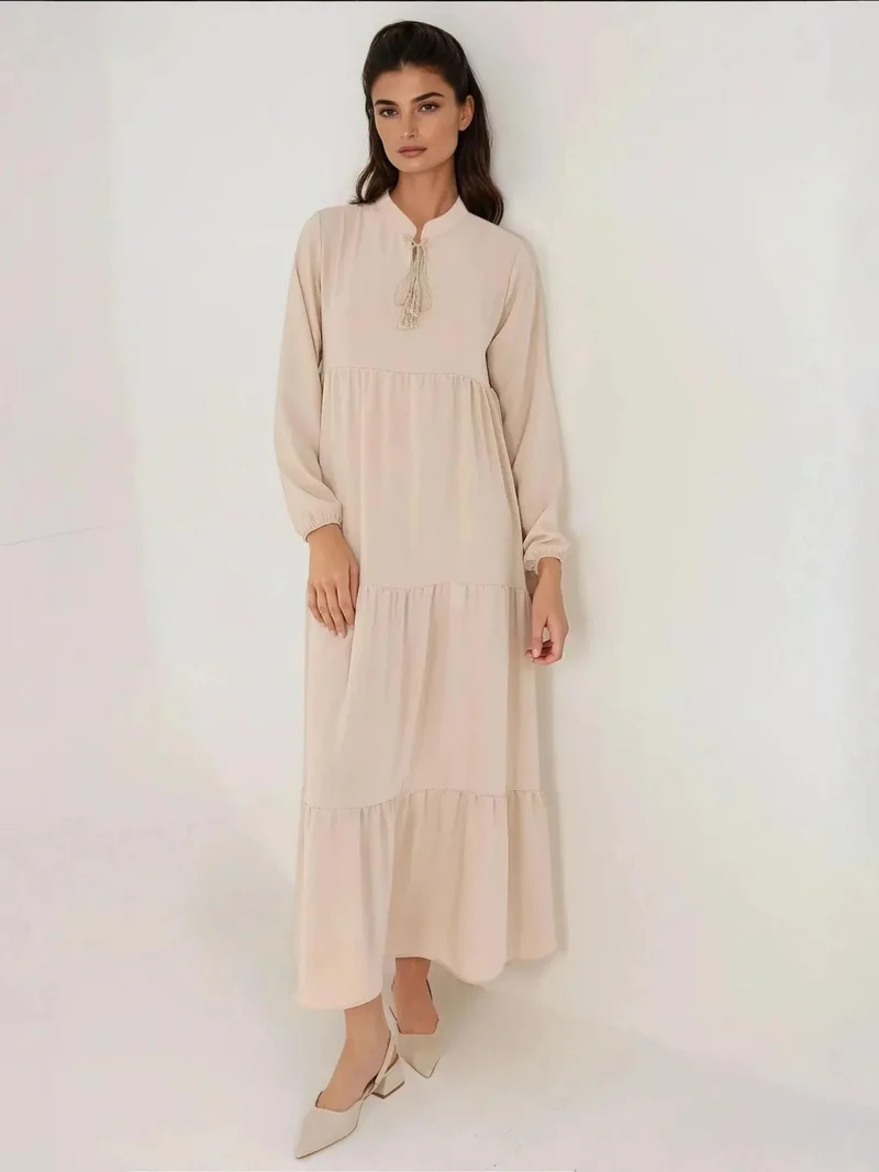 زوبعة فستان ماكسي بياقة دائرية مزين بأزرار