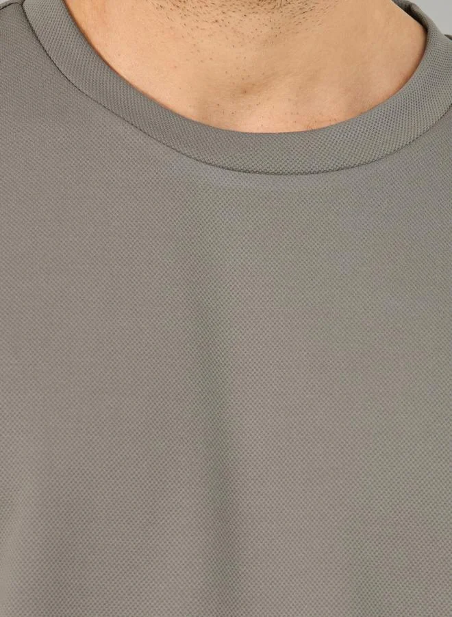 ستايلي Textured Knit Oversized Training T-Shirt