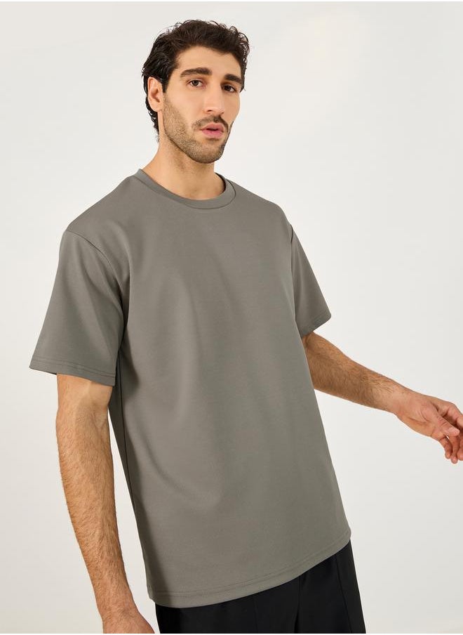 Textured Knit Oversized Training T-Shirt - pzsku/Z0EA0102E851B39F44C3EZ/45/_/1738970621/ce848ffc-5d8b-4722-86b0-e94e483150bd