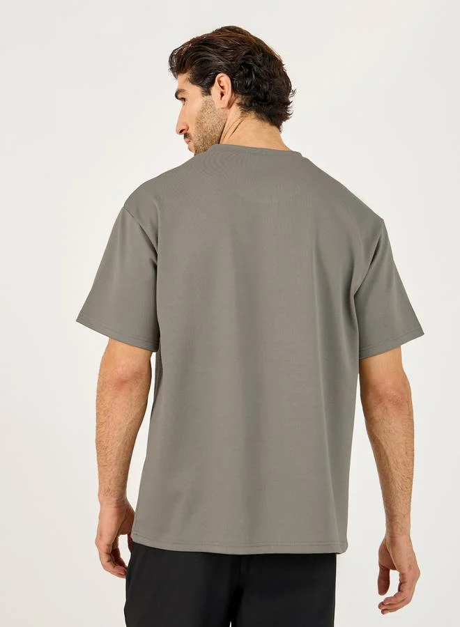 ستايلي Textured Knit Oversized Training T-Shirt