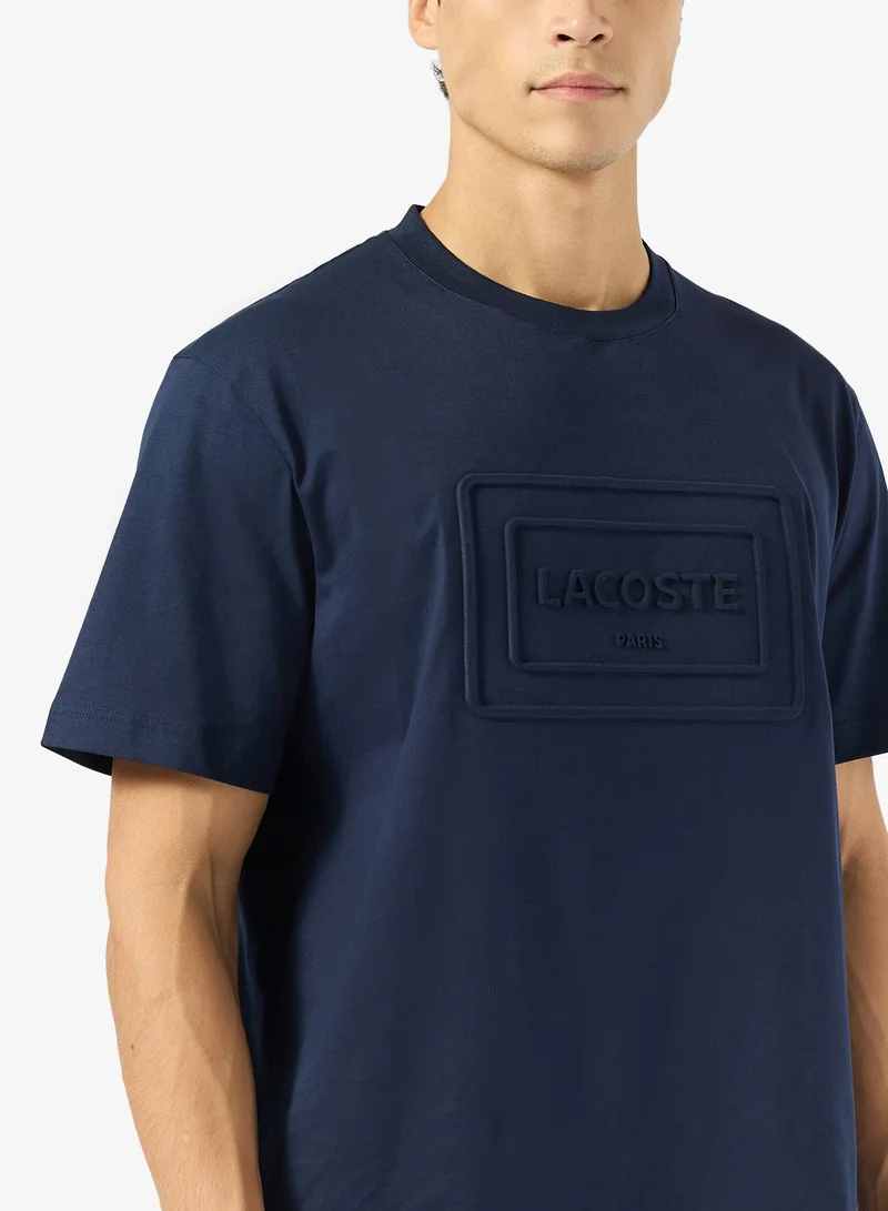 LACOSTE  Classic Fit Embossed T-Shirt for Men | Best Price UAE