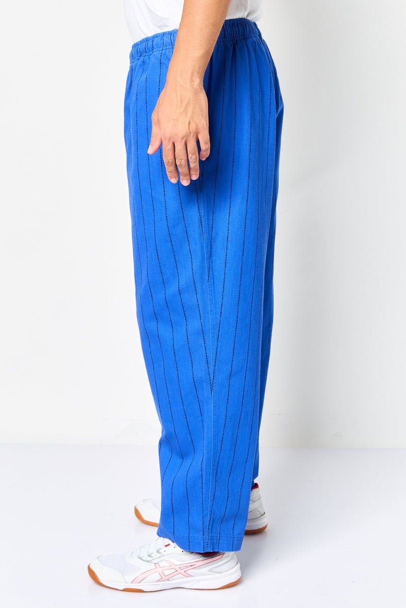 PUMA سروال رياضي للرجال بتصميم مخطط مناسب، متعدد الألوان - Image 3