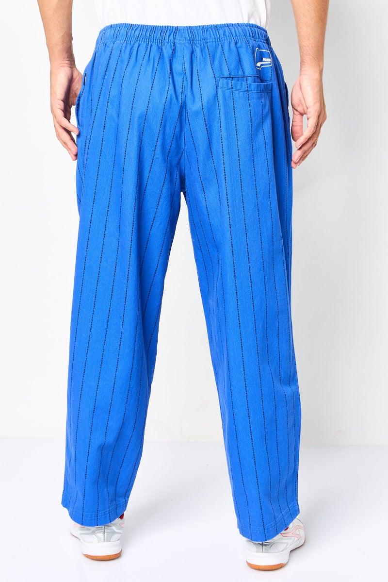 PUMA سروال رياضي للرجال بتصميم مخطط مناسب، متعدد الألوان - Image 4