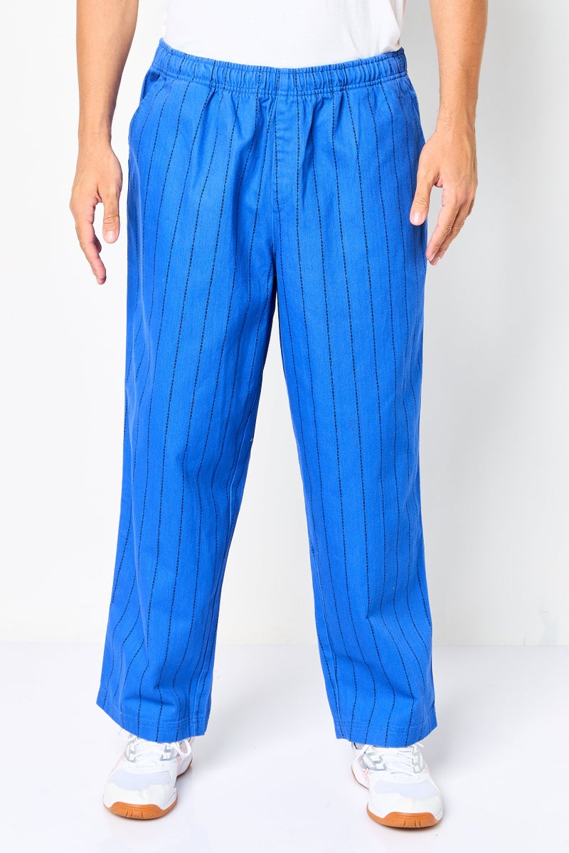 PUMA سروال رياضي للرجال بتصميم مخطط مناسب، متعدد الألوان - Image 1