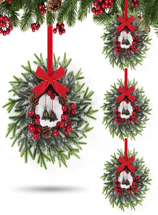 YLOLUL 4 PCS Mini Christmas Cabinets Wreaths for Kitchen Small Christmas Wreaths Artificial Norfolk Cedar Wreath with Red Velvet Ribbon Bows Bell Berry Hanging Garland for Door Wall Window Chair Porch Decor - Image 1