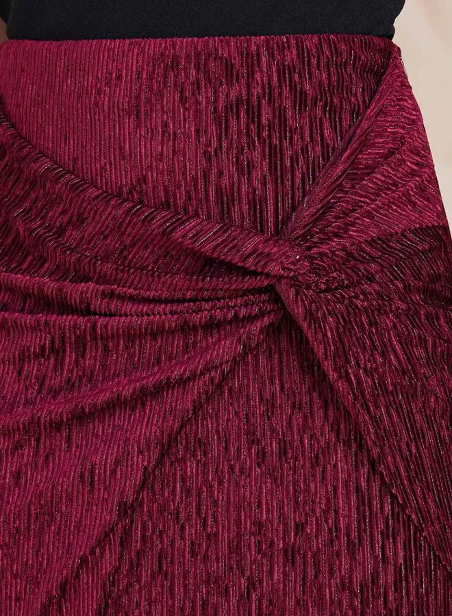 Styli Plisse Knotted Front Midi Skirt