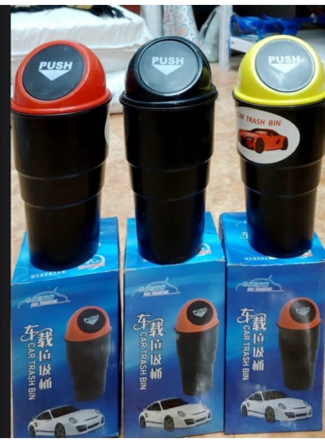A set of three small car trash bins. - Image 1