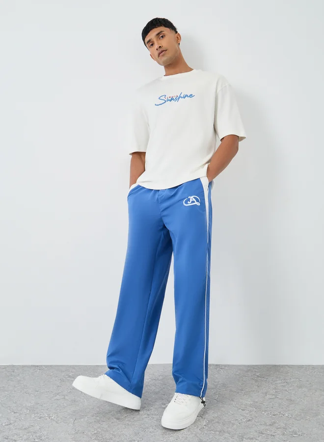 Styli Styli Woven Oversized Joggers with Side Piping and Adjustable Loop