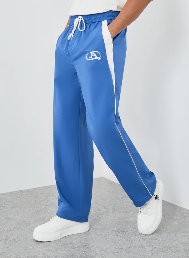 Styli Styli Woven Oversized Joggers with Side Piping and Adjustable Loop