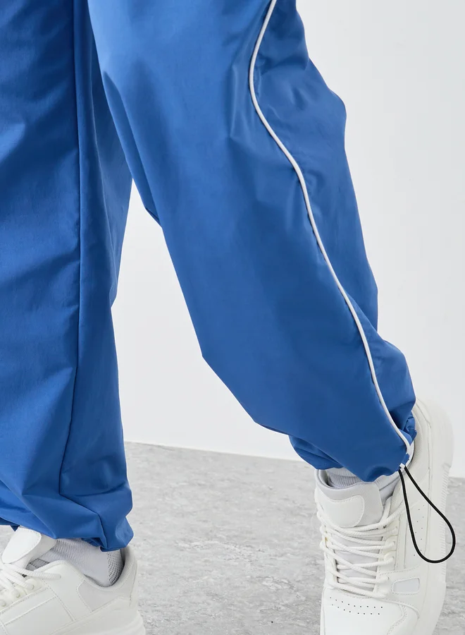 Styli Styli Woven Oversized Joggers with Side Piping and Adjustable Loop
