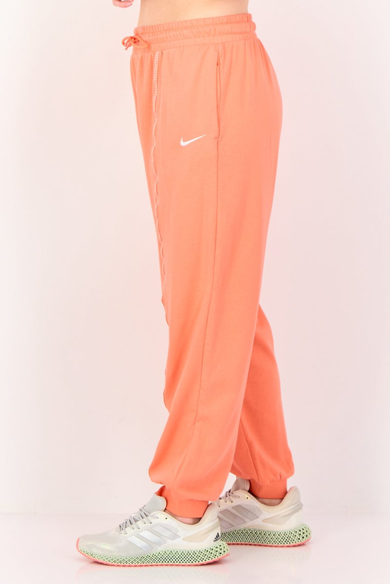 Nike سروال رياضي فضفاض للنساء، برتقالي - Image 2