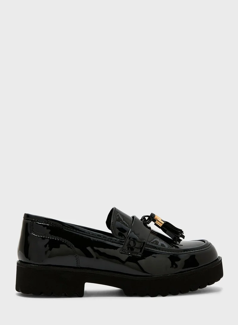 Truffle Tassel Chunky Loafer In Black