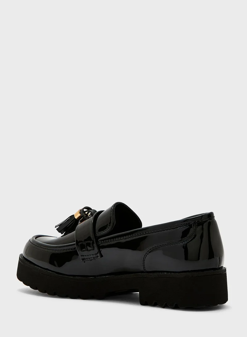 Truffle Tassel Chunky Loafer In Black