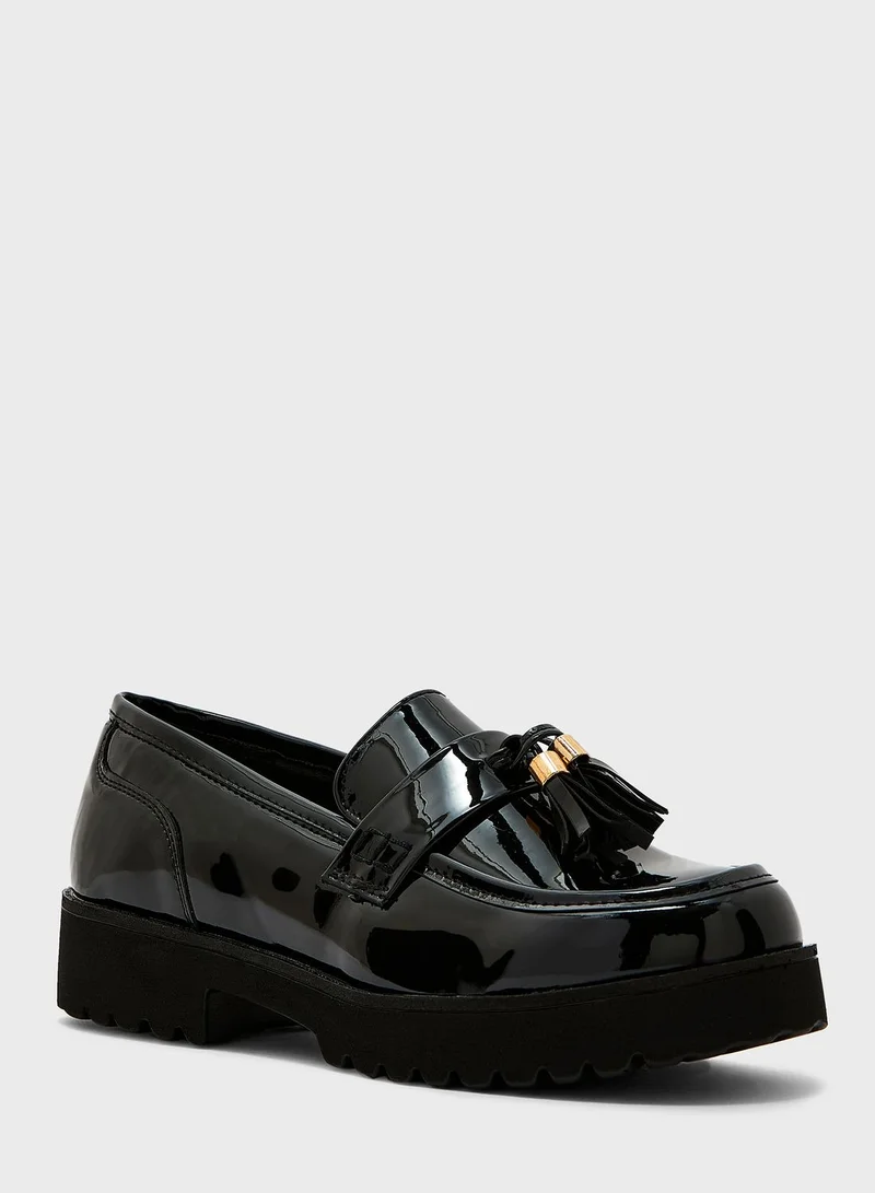 Truffle Tassel Chunky Loafer In Black