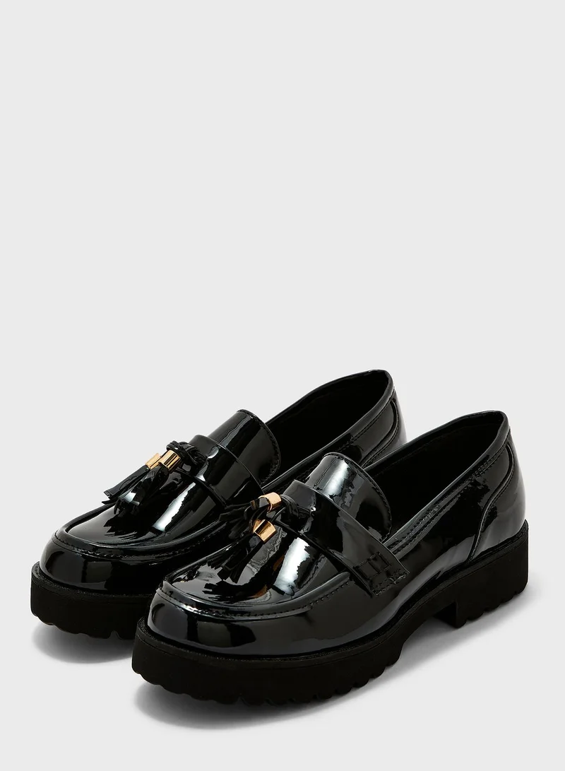 Truffle Tassel Chunky Loafer In Black
